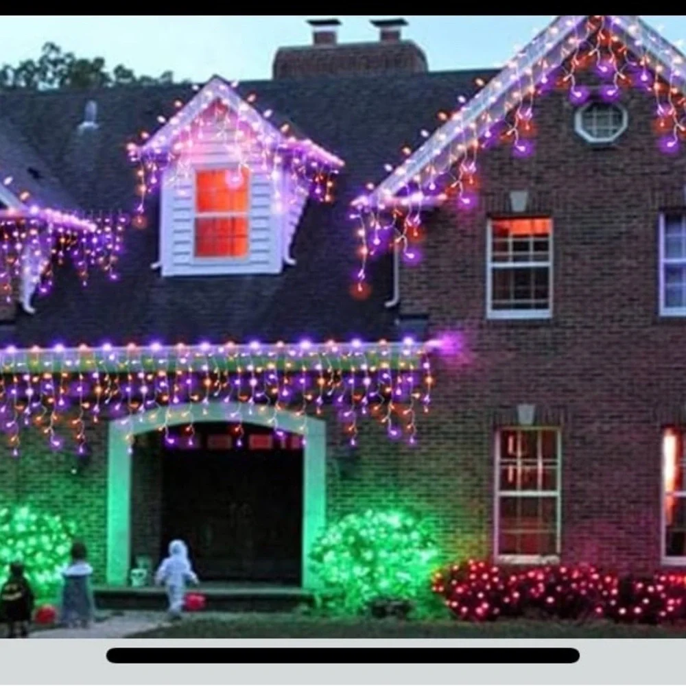 Halloween Joiedomi Icicle Lights with Purple and Orange Glow